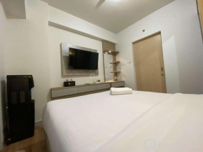 Comfort and Cozy Stay 1BR at The Alton Apartment By Travelio